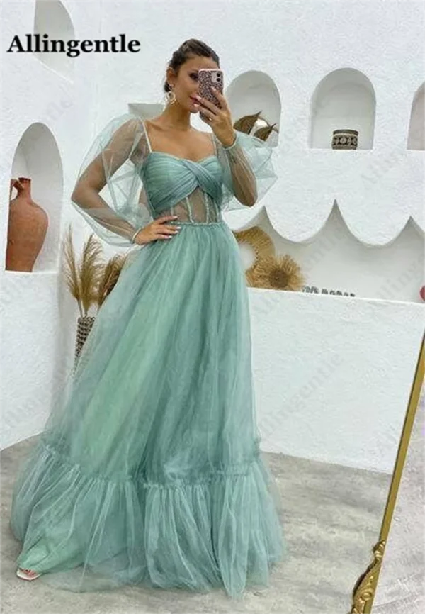 Orange prom dresses with tulle, puffy sleeves, and A-line design - Image 3