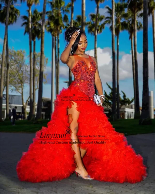 Orange prom dresses with beaded crystals, rhinestones, and sexy slit