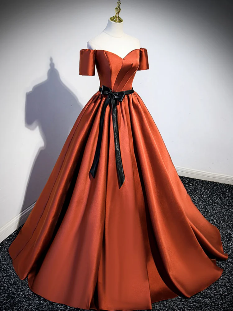 Belts & Sashes: Add Definition to Your Orange Prom Dress